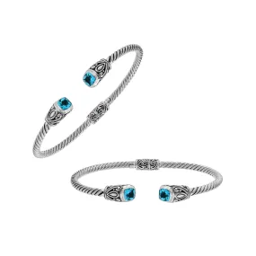 AB-1201-BT Sterling Silver Bangle With  Blue Topaz Q.