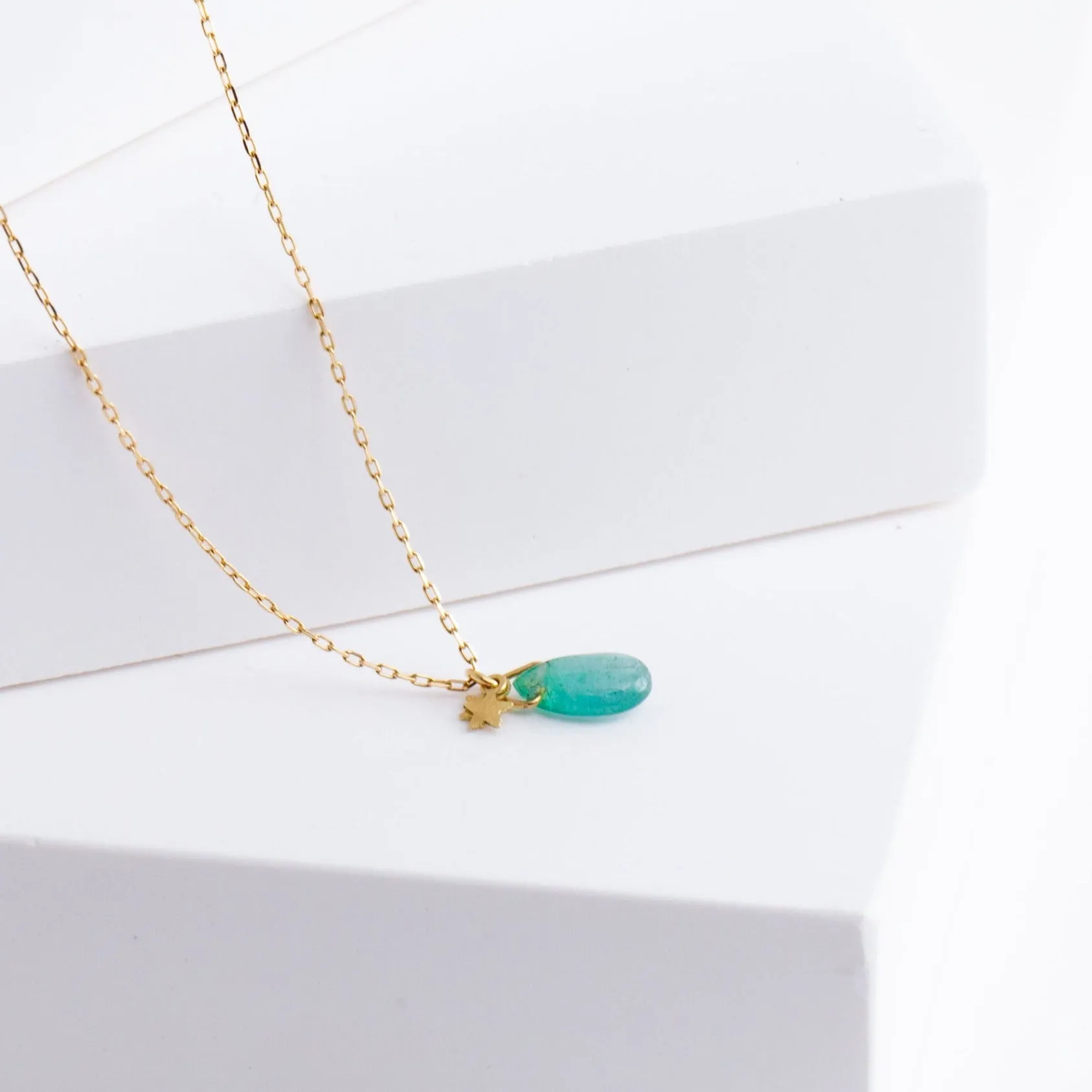 Emerald smiley necklace